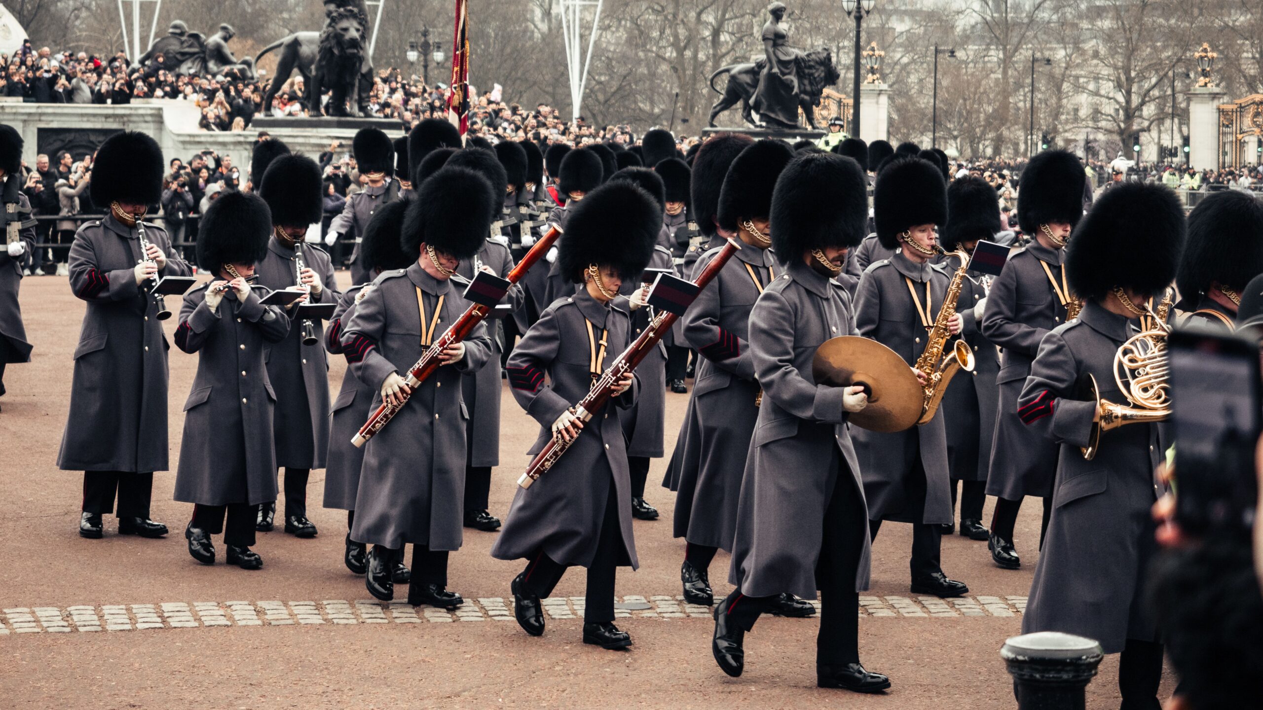 Security guards with fun hats playing instruments